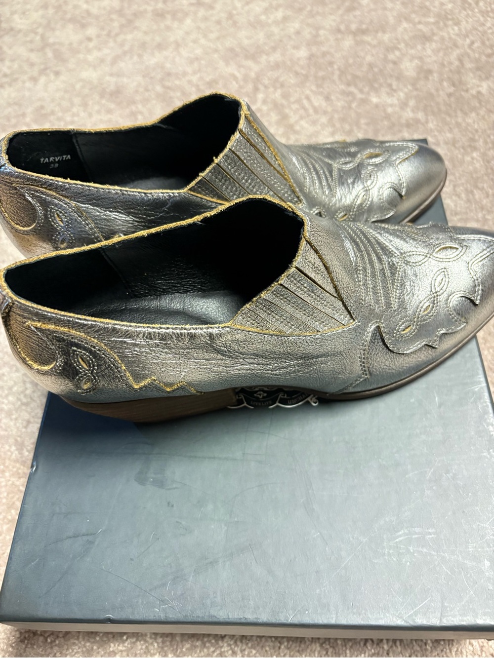 Silent D 
Cowboy shoes